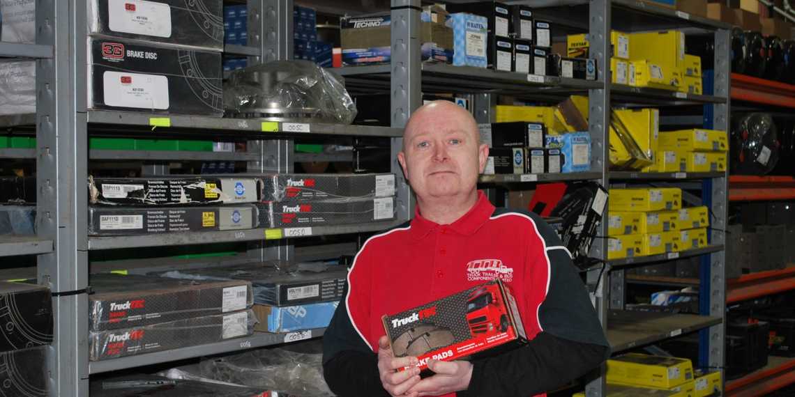 Male holding TruckTEC part